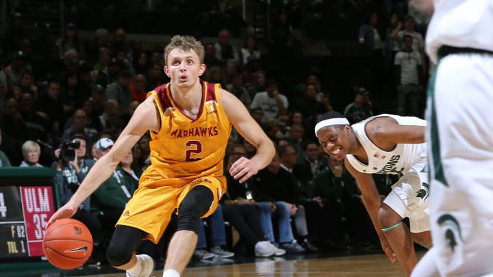 EAST LANSING, MI – NOVEMBER 14: Michael Ertel #2 of the Louisiana Monroe Warhawks drives past Cassius Winston #5 of the Michigan State Spartans in the second half at Breslin Center on November 14, 2018 in East Lansing, Michigan. (Photo by Rey Del Rio/Getty Images)