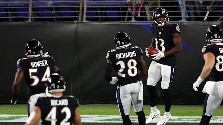 BALTIMORE, MARYLAND – SEPTEMBER 28: Devin Duvernay #13 of the Baltimore Ravens celebrates with his team after scoring a touchdown against the Kansas City Chiefs during the second quarter at M&T Bank Stadium on September 28, 2020 in Baltimore, Maryland. (Photo by Rob Carr/Getty Images)