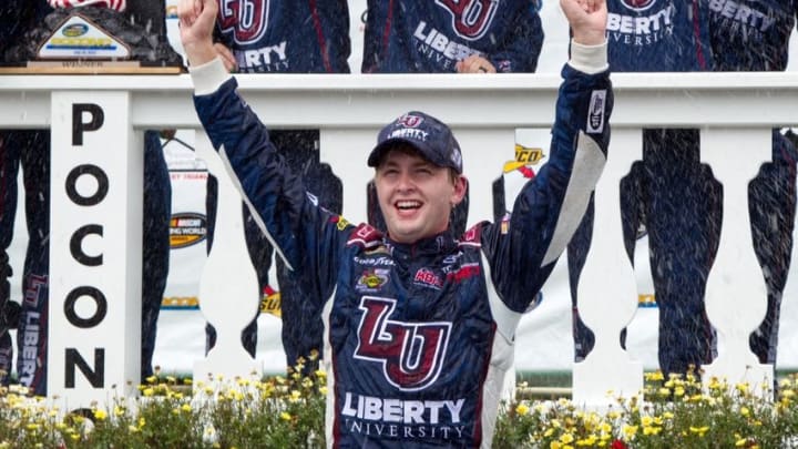 Jul 30, 2016; Long Pond, PA, USA; NASCAR Camping World Truck Series driver William Byron celebrates in victory lane after winning the Pocono Mountains 150 at Pocono Raceway. Mandatory Credit: Matthew O