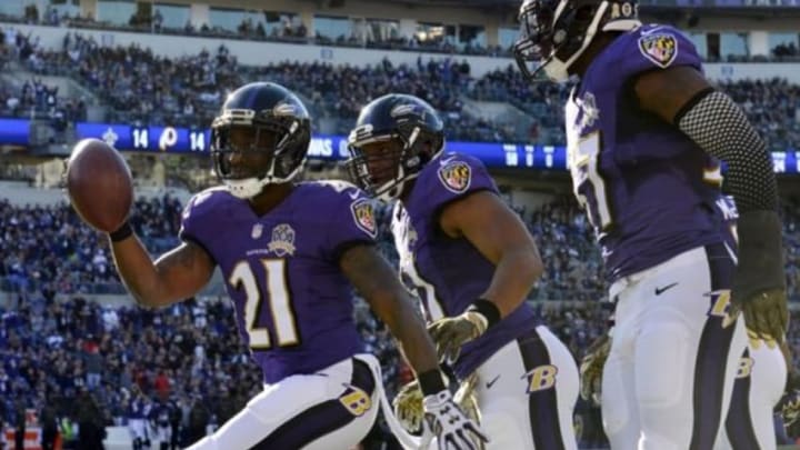 Nov 15, 2015; Baltimore, MD, USA; Baltimore Ravens cornerback Lardarius Webb (21) celebrates after intercepting a pass from Jacksonville Jaguars quarterback Blake Bortles (not pictured) during the second quarter at M&T Bank Stadium. Mandatory Credit: Tommy Gilligan-USA TODAY Sports