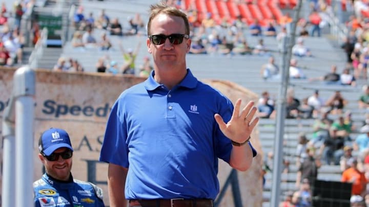 Apr 17, 2016; Bristol, TN, USA; NASCAR Sprint Cup Series driver Dale Earnhardt Jr. (88) and former NFL and Tennessee Volunteers quarterback Peyton Manning before the Food City 500 at Bristol Motor Speedway. Mandatory Credit: Randy Sartin-USA TODAY Sports