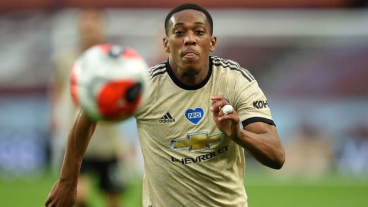 Manchester United's French striker Anthony Martial chases the ball during the English Premier League football match between Aston Villa and Manchester United at Villa Park in Birmingham, central England on July 9, 2020. (Photo by Oli SCARFF / POOL / AFP) / RESTRICTED TO EDITORIAL USE. No use with unauthorized audio, video, data, fixture lists, club/league logos or 'live' services. Online in-match use limited to 120 images. An additional 40 images may be used in extra time. No video emulation. Social media in-match use limited to 120 images. An additional 40 images may be used in extra time. No use in betting publications, games or single club/league/player publications. / (Photo by OLI SCARFF/POOL/AFP via Getty Images)