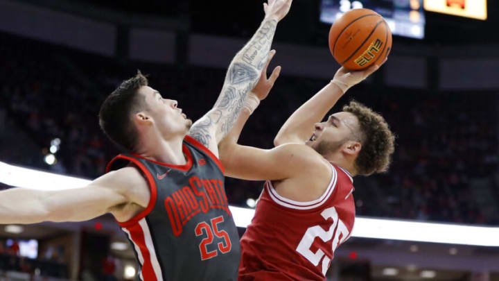 Feb 21, 2022; Columbus, Ohio, USA; Indiana Hoosiers forward Race Thompson (25) shoots defended by Ohio State Buckeyes forward Kyle Young (25) during the first half at Value City Arena. Mandatory Credit: Joseph Maiorana-USA TODAY Sports