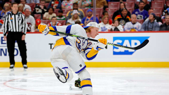 Feb 3, 2023; Sunrise, Florida, USA; Buffalo Sabres defensemen Rasmus Dahlin (26) shoots the puck during the 2023 NHL All-Star Skills Competition at FLA Live Arena. Mandatory Credit: Sam Navarro-USA TODAY Sports