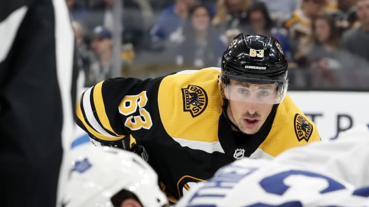 BOSTON, MA - OCTOBER 22: Boston Bruins left wing Brad Marchand (63) eyes a face off during a game between the Boston Bruins and the Toronto Maple Leafs on October 22, 2019, at TD Garden in Boston, Massachusetts. (Photo by Fred Kfoury III/Icon Sportswire via Getty Images)