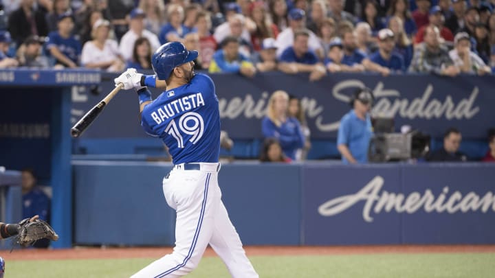 May 27, 2017; Toronto, Ontario, CAN; Toronto Blue Jays right fielder Jose Bautista (19) hits a three run home run in the fifth inning against the Texas Rangers at Rogers Centre. Mandatory Credit: Nick Turchiaro-USA TODAY Sports