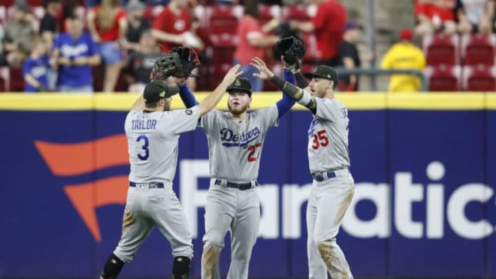 CINCINNATI, OH - MAY 17: Chris Taylor #3, Alex Verdugo #27 and Cody Bellinger #35 of the Los Angeles Dodgers celebrate after the game against the Cincinnati Reds at Great American Ball Park on May 17, 2019 in Cincinnati, Ohio. The Dodgers won 6-0. (Photo by Joe Robbins/Getty Images)