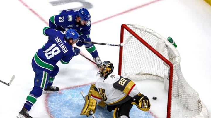 EDMONTON, ALBERTA - AUGUST 30: Bo Horvat #53 of the Vancouver Canucks scores a goal past Marc-Andre Fleury #29 of the Vegas Golden Knights during the second period in Game Four of the Western Conference Second Round during the 2020 NHL Stanley Cup Playoffs at Rogers Place on August 30, 2020 in Edmonton, Alberta, Canada. (Photo by Bruce Bennett/Getty Images)