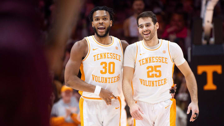 Tennessee guard Josiah-Jordan James (30) and Tennessee guard Santiago Vescovi (25) smile after James made a three-pointer during a basketball game between Tennessee and Texas A&M held at Thompson-Boling Arena in Knoxville, Tenn., on Tuesday, Feb. 1, 2022.Kns Vols Texas A M Hoops Bp
