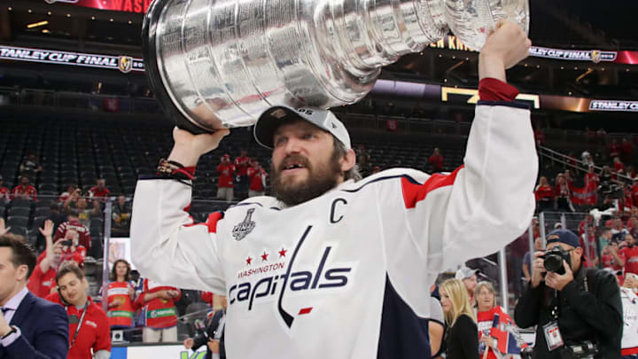 LAS VEGAS, NV - JUNE 07: Alex Ovechkin #8 of the Washington Capitals carries the Stanley Cup in celebration after his team defeated the Vegas Golden Knights 4-3 in Game Five of the 2018 NHL Stanley Cup Final at the T-Mobile Arena on June 7, 2018 in Las Vegas, Nevada. (Photo by Bruce Bennett/Getty Images)