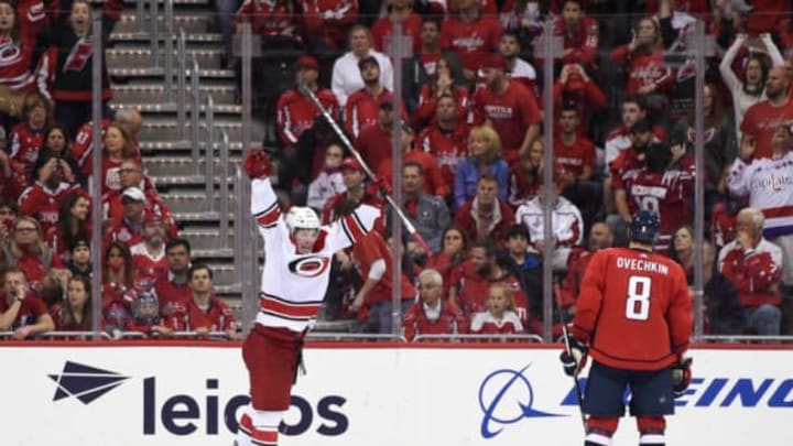 WASHINGTON, DC – APRIL 24: Brock McGinn #23 of the Carolina Hurricanes celebrates after scoring the game winning goal in the second overtime period against the Washington Capitals in Game Seven of the Eastern Conference First Round during the 2019 NHL Stanley Cup Playoffs at Capital One Arena on April 24, 2019 in Washington, DC. The Hurricanes defeated the Capitals 4-3 in the second overtime period to move on to Round Two of the Stanley Cup playoffs. (Photo by Patrick McDermott/NHLI via Getty Images)