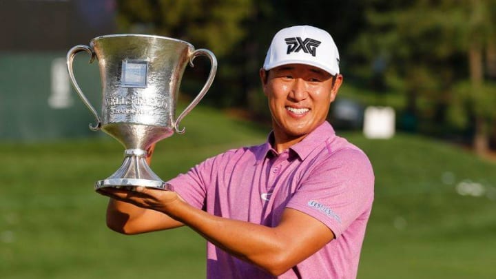May 8, 2016; Charlotte, NC, USA; James Hahn (USA) holds the trophy after winning the 2016 Wells Fargo Championship at Quail Hollow Club. Mandatory Credit: Jim Dedmon-USA TODAY Sports