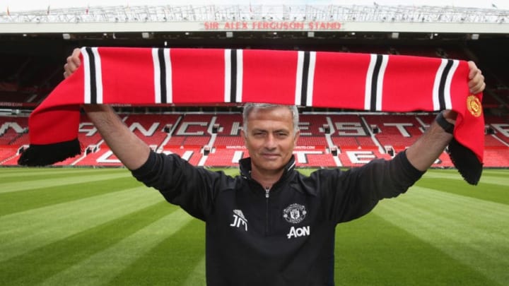 Jose Mourinho posed for photographers at his unveiling as the new Manchester United manager