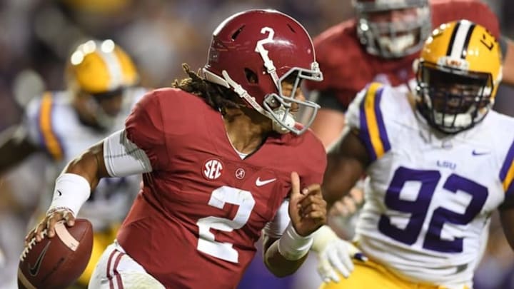 Nov 5, 2016; Baton Rouge, LA, USA; Alabama Crimson Tide quarterback Jalen Hurts (2) scrambles for yardage against the LSU Tigers during the third quarter at Tiger Stadium. Mandatory Credit: John David Mercer-USA TODAY Sports