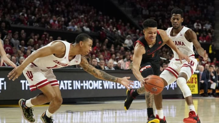 COLLEGE PARK, MD - JANUARY 04: Anthony Cowan Jr. #1 of the Maryland Terrapins dribbles as Devonte Green #11 and Al Durham #1 of the Indiana Hoosiers defend in the second half at Xfinity Center on January 4, 2020 in College Park, Maryland. (Photo by Patrick McDermott/Getty Images)