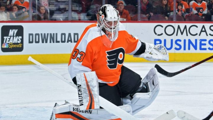 PHILADELPHIA, PENNSYLVANIA - NOVEMBER 08: Calvin Pickard #33 of the Philadelphia Flyers makes a save against the Arizona Coyotes at the Wells Fargo Center on November 08, 2018 in Philadelphia, Pennsylvania. (Photo by Drew Hallowell/Getty Images)