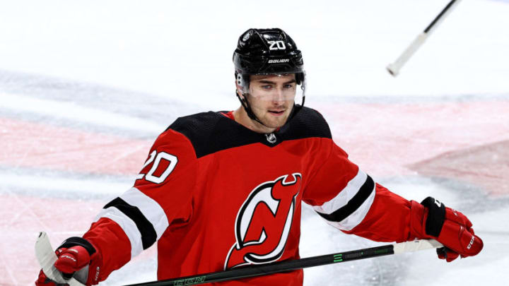 NEWARK, NEW JERSEY - JANUARY 16: Michael McLeod #20 of the New Jersey Devils skates during a stop in play against the Boston Bruins at Prudential Center on January 16, 2021 in Newark, New Jersey. Due to Covid-19 restrictions, the game is played without fans. (Photo by Elsa/Getty Images)