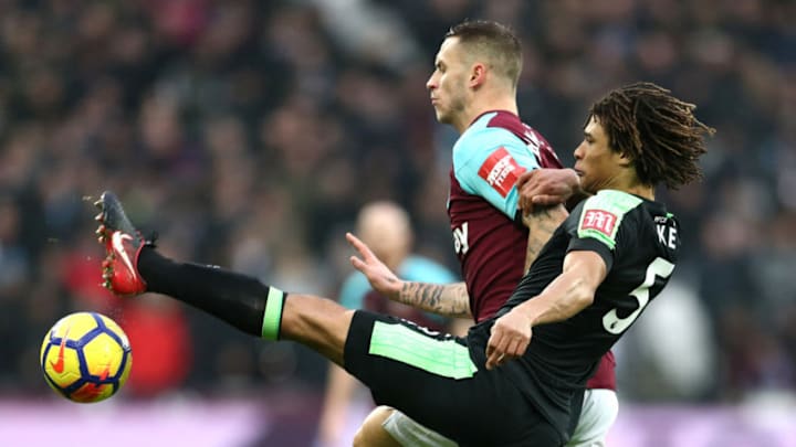 LONDON, ENGLAND - JANUARY 20: Marko Arnautovic of West Ham United and Nathan Ake of AFC Bournemouth battle for the ball during the Premier League match between West Ham United and AFC Bournemouth at London Stadium on January 20, 2018 in London, England. (Photo by Catherine Ivill/Getty Images)