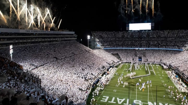 The Penn State Nittany Lions run onto the field to play Minnesota in a White Out game at Beaver Stadium on Saturday, Oct. 22, 2022, in State College. Penn State won, 45-17.Hes Dr 102222 Whiteout