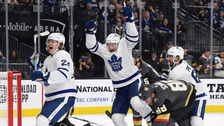 LAS VEGAS, NEVADA - NOVEMBER 19: Kasperi Kapanen #24 and Zach Hyman #11 of the Toronto Maple Leafs celebrate after Hyman scored a third-period goal against the Vegas Golden Knights during their game at T-Mobile Arena on November 19, 2019 in Las Vegas, Nevada. The Golden Knights defeated the Leafs 4-2. (Photo by Ethan Miller/Getty Images)