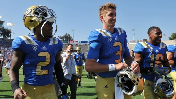 September 5, 2015; Pasadena, CA, USA; UCLA Bruins quarterback Josh Rosen (3), wide receiver Jordan Lasley (2) and defensive back Octavius Spencer (18) following the 34-16 victory against the Virginia Cavaliers at the Rose Bowl. Mandatory Credit: Gary A. Vasquez-USA TODAY Sports