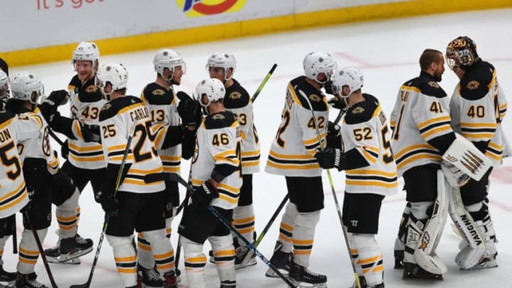 ST. LOUIS, MO - JUNE 1: The Boston Bruins celebrate at the end of the game as goalie Tuukka Rask, far right, is congratulated by goalie Jaroslav Halak. The St. Louis Blues host the Boston Bruins in Game 3 of the 2019 Stanley Cup Finals at the Enterprise Center in St. Louis, MO on June 1, 2019. (Photo by John Tlumacki/The Boston Globe via Getty Images)