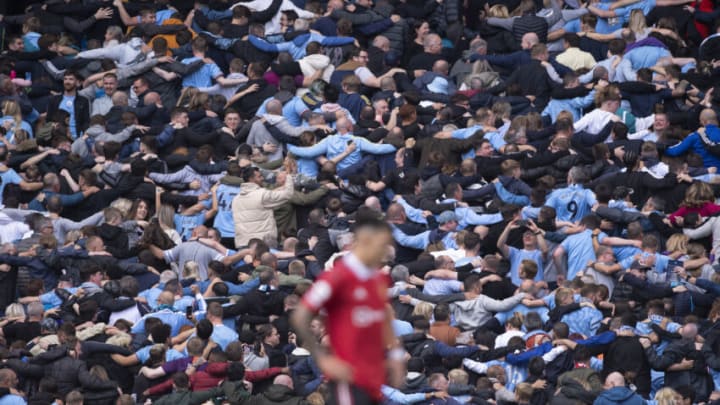 MANCHESTER, ENGLAND - OCTOBER 02: Manchester City fans in celebratory mood during the Premier League match between Manchester City and Manchester United at Etihad Stadium on October 2, 2022 in Manchester, United Kingdom. (Photo by Visionhaus/Getty Images)