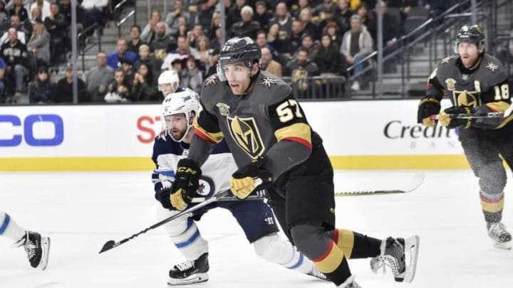 LAS VEGAS, NV - NOVEMBER 10: David Perron #57 of the Vegas Golden Knights and Josh Morrissey #44 of the Winnipeg Jets skate to the puck during the game at T-Mobile Arena on November 10, 2017 in Las Vegas, Nevada. (Photo by Jeff Bottari/NHLI via Getty Images)
