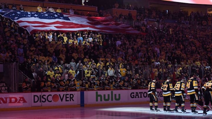 NHL DFS: PITTSBURGH, PA - APRIL 11: Members of the Pittsburgh Penguins stand at attention for the National Anthem in Game One of the Eastern Conference First Round during the 2018 NHL Stanley Cup Playoffs against the Philadelphia Flyers at PPG PAINTS Arena on April 11, 2018 in Pittsburgh, Pennsylvania. (Photo by Justin Berl/Getty Images)