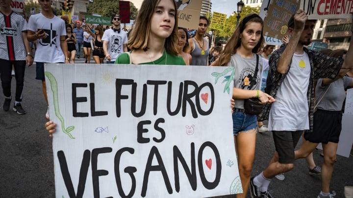 A protester holds a placard in defense of the vegan diet during the demonstration. Convened by the Barcelona Animal Save organization hundreds of people have demonstrated in defense of animal rights and a vegan diet. (Photo by Paco Freire/SOPA Images/LightRocket via Getty Images)