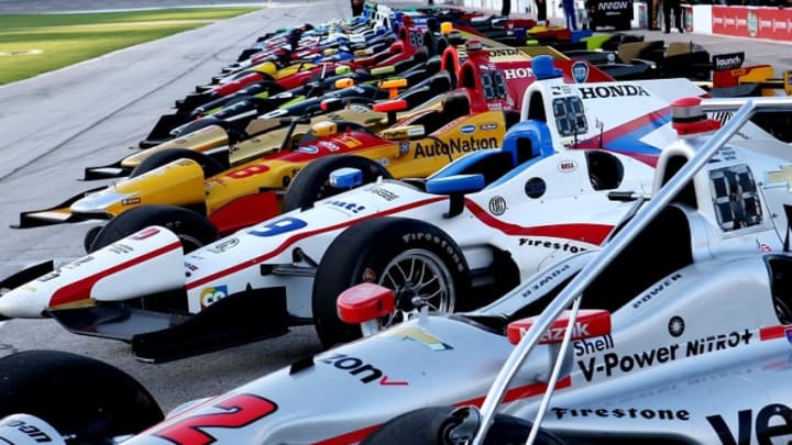 Verizon IndyCar Series cars sit on pit lane at Pocono Raceway. Photo Credit: Chris Jones/Courtesy of IndyCar