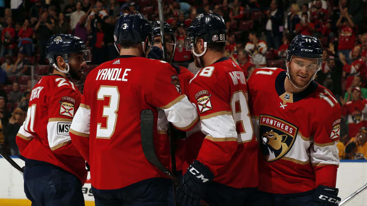 SUNRISE, FL – APRIL 3: Jonathan Huberdeau #11 of the Florida Panthers celebrates his goal with teammates during the first period against the Nashville Predators at the BB&T Center on April 3, 2018 in Sunrise, Florida. (Photo by Eliot J. Schechter/NHLI via Getty Images)
