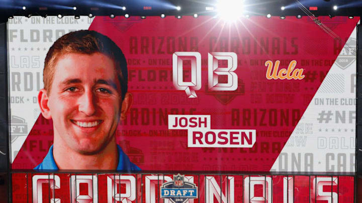 ARLINGTON, TX - APRIL 26: A video board displays an image of Josh Rosen of UCLA after he was picked #10 overall by the Arizona Cardinals during the first round of the 2018 NFL Draft at AT&T Stadium on April 26, 2018 in Arlington, Texas. (Photo by Tim Warner/Getty Images) ARLINGTON, TX - APRIL 26: A video board displays an image of Josh Rosen of UCLA after he was picked #10 overall by the Arizona Cardinals during the first round of the 2018 NFL Draft at AT&T Stadium on April 26, 2018 in Arlington, Texas. (Photo by Tim Warner/Getty Images)