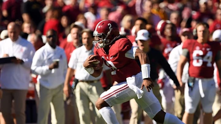 Oct 22, 2016; Tuscaloosa, AL, USA; Alabama Crimson Tide quarterback Jalen Hurts (2) scrambles up the field against the Texas A&M Aggies during the first quarter at Bryant-Denny Stadium. Mandatory Credit: John David Mercer-USA TODAY Sports