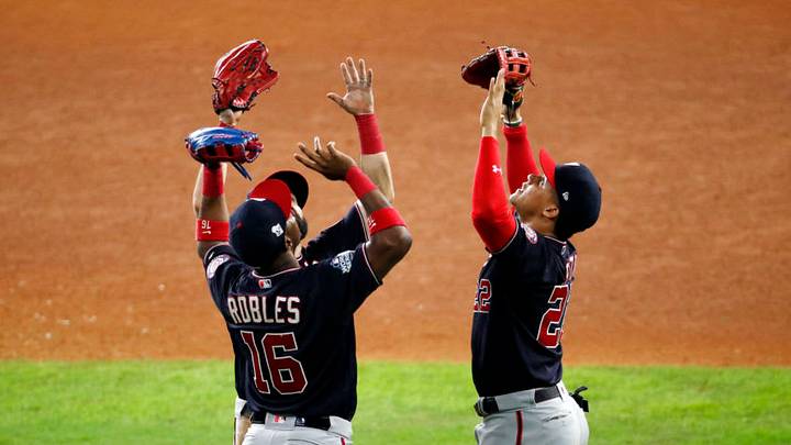 HOUSTON, TEXAS - OCTOBER 29: Victor Robles #16, Adam Eaton #2 and Juan Soto #22 of the Washington Nationals celebrate their teams 7-2 win against the Houston Astros in Game Six of the 2019 World Series at Minute Maid Park on October 29, 2019 in Houston, Texas. (Photo by Tim Warner/Getty Images) HOUSTON, TEXAS - OCTOBER 29: Victor Robles #16, Adam Eaton #2 and Juan Soto #22 of the Washington Nationals celebrate their teams 7-2 win against the Houston Astros in Game Six of the 2019 World Series at Minute Maid Park on October 29, 2019 in Houston, Texas. (Photo by Tim Warner/Getty Images)