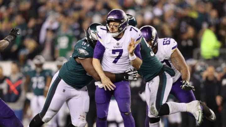 PHILADELPHIA, PA - JANUARY 21: Case Keenum #7 of the Minnesota Vikings is tackled by Fletcher Cox #91 of the Philadelphia Eagles during the fourth quarter in the NFC Championship game at Lincoln Financial Field on January 21, 2018 in Philadelphia, Pennsylvania. (Photo by Patrick Smith/Getty Images)