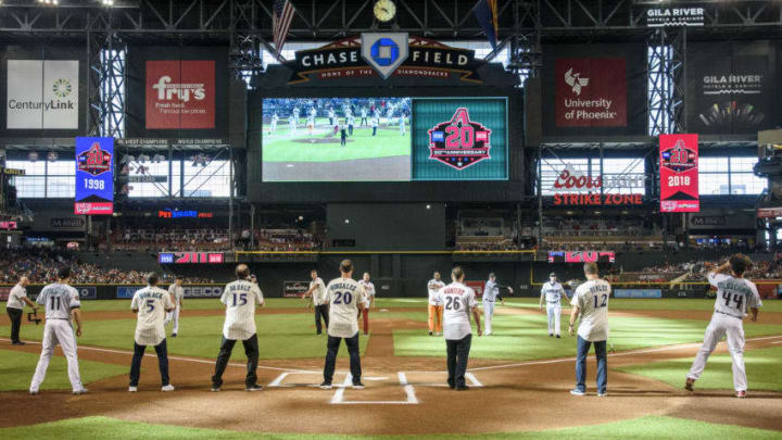 PHOENIX, AZ - AUGUST 4: Members of the Arizona Diamondbacks 20th Anniversary Team throw out the first pitch prior to a game against the San Francisco Giants at Chase Field on August 4, 2018 in Phoenix, Arizona. (Photo by Kelsey Grant/Arizona Diamondbacks/Getty Images)