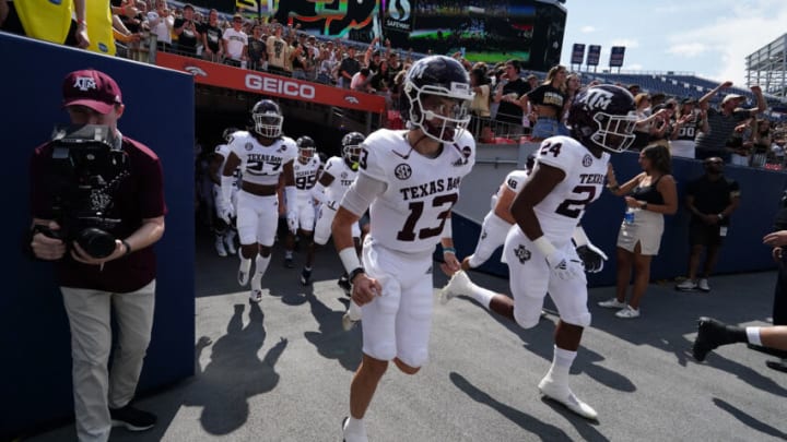 Sep 11, 2021; Denver, Colorado, USA; Texas A&M Aggies quarterback Haynes King (13) heads to the field before the game against the Colorado Buffaloes at Empower Field at Mile High. Mandatory Credit: Ron Chenoy-USA TODAY Sports