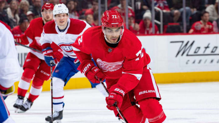 DETROIT, MI - JANUARY 08: Andreas Athanasiou #72 of the Detroit Red Wings skates up ice with the puck against the Montreal Canadiens during an NHL game at Little Caesars Arena on January 8, 2019 in Detroit, Michigan. The Canadiens defeated the Red Wings 3-2. (Photo by Dave Reginek/NHLI via Getty Images)