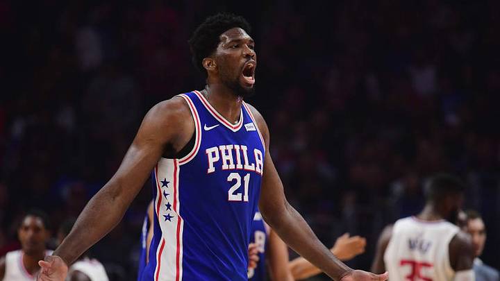 LOS ANGELES, CA - NOVEMBER 13: Joel Embiid #21 of the Philadelphia 76ers reacts after a foul from Willie Reed #35 of the LA Clippers during the first half at Staples Center on November 13, 2017 in Los Angeles, California. (Photo by Harry How/Getty Images)