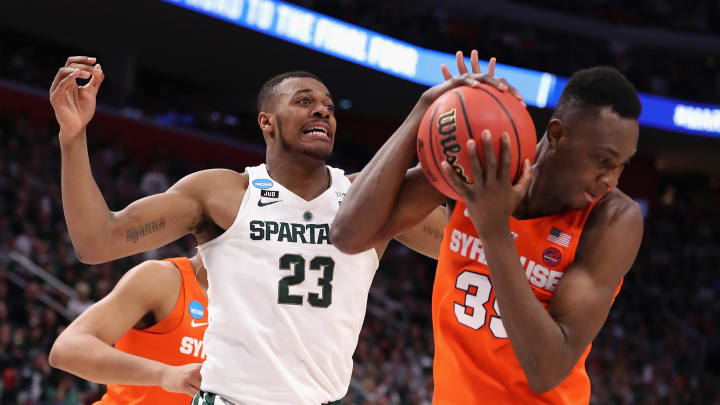 DETROIT, MI – MARCH 18: Xavier Tillman #23 of the Michigan State Spartans battles for the ball with Bourama Sidibe #35 of the Syracuse Orange during the first half in the second round of the 2018 NCAA Men’s Basketball Tournament at Little Caesars Arena on March 18, 2018 in Detroit, Michigan. (Photo by Elsa/Getty Images)