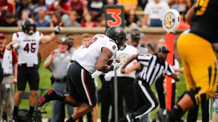 COLUMBIA, MO - SEPTEMBER 21: D.J. Wonnum #8 of the South Carolina Gamecocks returns an interception back to the Missouri Tigers 1-yard line in the second quarter at Faurot Field/Memorial Stadium on September 21, 2019 in Columbia, Missouri. (Photo by David Eulitt/Getty Images)