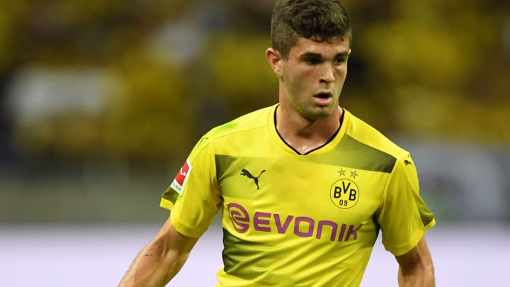 SAITAMA, JAPAN – JULY 15: Christian Pulisic of Borussia Dortmund runs with the ball during the preseason friendly match between Urawa Red Diamonds and Borussia Dortmund at Saitama Stadium on July 15, 2017 in Saitama, Japan. (Photo by Atsushi Tomura/Getty Images)