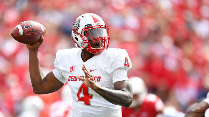 MADISON, WI - SEPTEMBER 08: Sheriron Jones #4 of the New Mexico Lobos drops back to pass during the first half of a game against the Wisconsin Badgers at Camp Randall Stadium on September 8, 2018 in Madison, Wisconsin. (Photo by Stacy Revere/Getty Images)