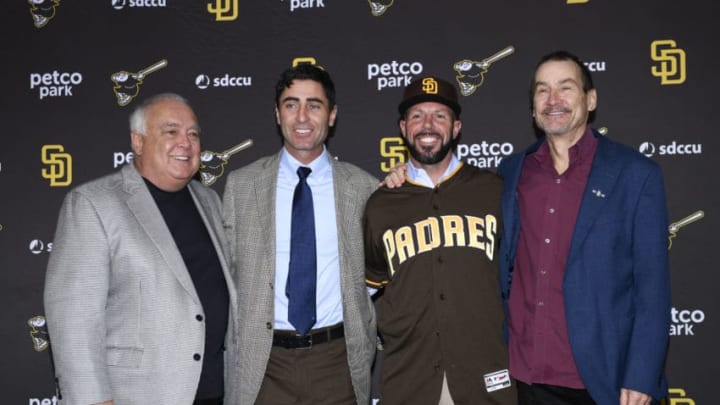 SAN DIEGO, CA – OCTOBER 31: Jayce Tingler (2nd-R) poses for a photo with San Diego Padres executive chairman Ron Fowler (L) general manager A.J. Preller (2nd-L) and general partner Peter Seidler (R) at a news conference held to announce Tingler’s hiring as the new manager of the San Diego Padres at Petco Park October 31, 2019 in San Diego, California. (Photo by Denis Poroy/Getty Images)