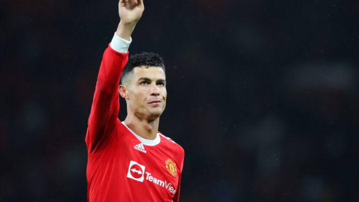 MANCHESTER, ENGLAND - FEBRUARY 15: Cristiano Ronaldo of Manchester United celebrates after the Premier League match between Manchester United and Brighton & Hove Albion at Old Trafford on February 15, 2022 in Manchester, England. (Photo by James Gill - Danehouse/Getty Images)