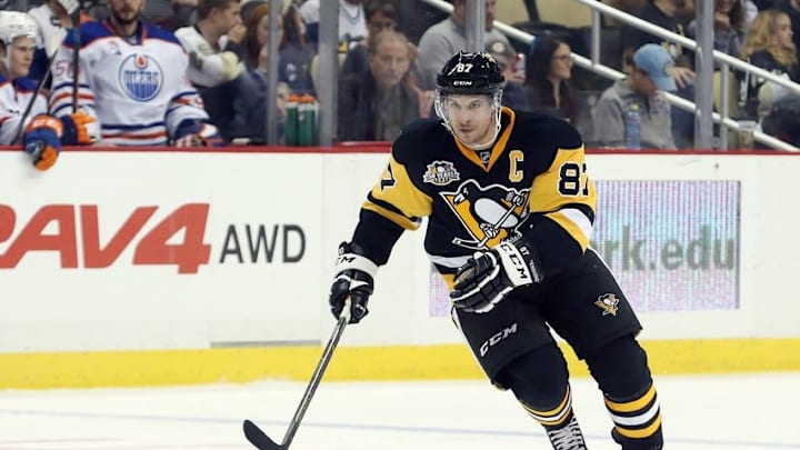 Nov 8, 2016; Pittsburgh, PA, USA; Pittsburgh Penguins center Sidney Crosby (87) chases the puck against the Edmonton Oilers during the second period at the PPG Paints Arena. Mandatory Credit: Charles LeClaire-USA TODAY Sports