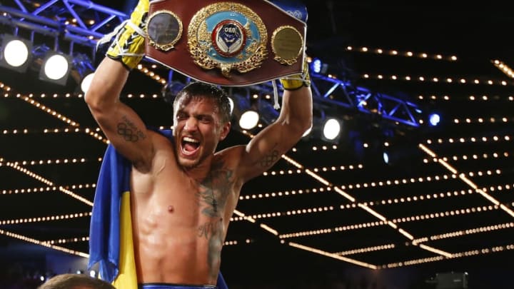 NEW YORK, NY - JUNE 11: Vasyl Lomachenko holds the championship belt after defeating Roman Martinez by knock out during the fifth round of their Junior Lightweight WBO World Championship bout on June 11, 2016 at the Theater at Madison Square Garden in New York City. (Photo by Rich Schultz/Getty Images)