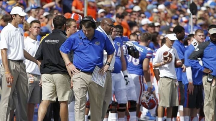 Nov 9, 2013; Gainesville, FL, USA; Florida Gators head coach Will Muschamp reacts on the sidelines against the Vanderbilt Commodores during the second quarter at Ben Hill Griffin Stadium. Mandatory Credit: Kim Klement-USA TODAY Sports
