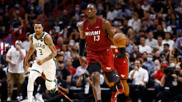 Bam Adebayo #13 of the Miami Heat dribbles up the court against the Milwaukee Bucks(Photo by Michael Reaves/Getty Images)